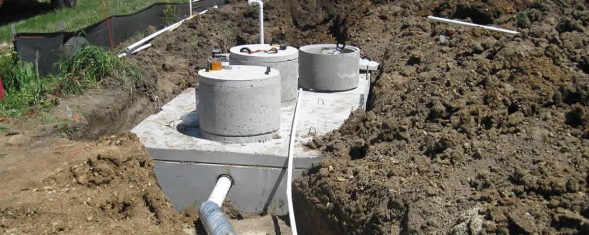 Septic system repair and installation site with tank access ports in Nashville, TN